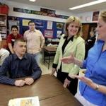 Beth Lindstrom spoke (center) to students at Stoneham High School in 2005.